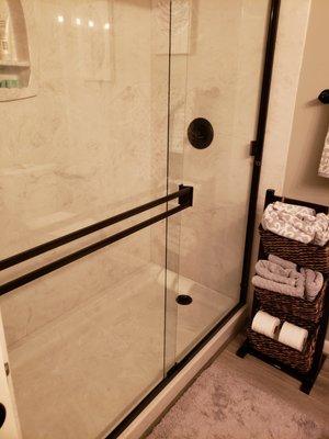 Cultured Marble Shower Wall and Shower Enclosure.