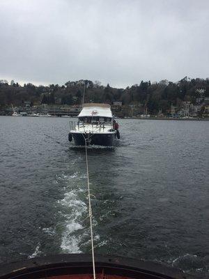 Tug General Lee with salvaged yacht on Lake Washington