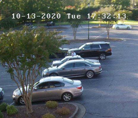 Here's a picture of the POS keying my car.  He steals from me and then vandalizes MY car.