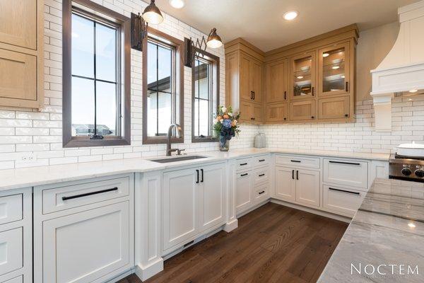 Tiled backsplash and quartz countertops