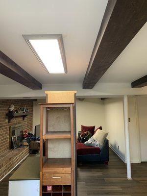 Exposed beams build with a bronzed stain