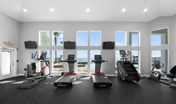 Gym overlooking pool and bay