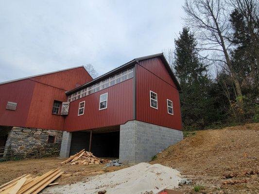 Addition built on to the existing barn for a clients custom cabinetry and metal fabricating business! Call for a free estimate today!