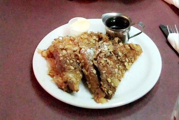 The most delicious French toast ever! Coated in cinnamon, oats, and cornflakes and fried up to perfection!