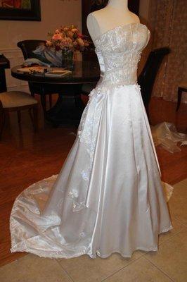 Wedding dress is designed and made by the new manager. So beautiful!