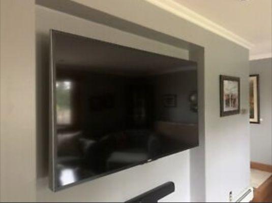 TV mounting with cables hidden