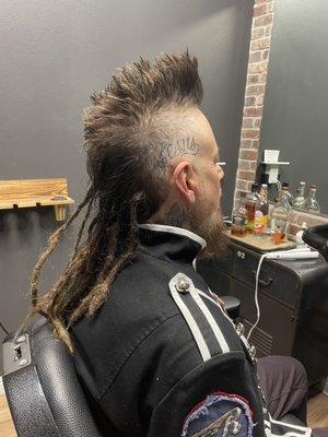 Burst fade mohawk.