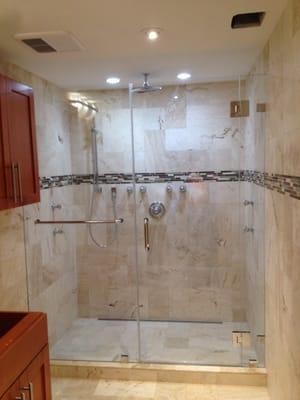 Installations of Frameless Shower Glass Doors, custom mirrors, glass shelves, 24/7 emergency glass repairs.