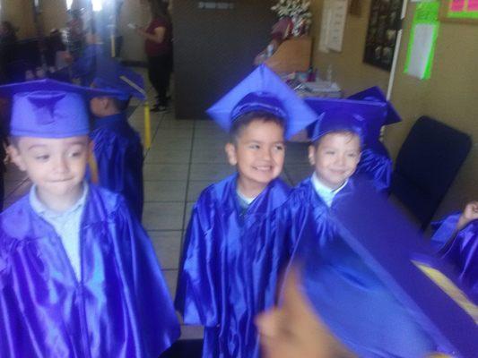 Aurelio and his friends on graduation  day.