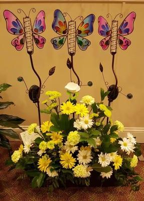 Lovely funeral arrangement w/ gifts incorporated for family members to keep & cherish. Thank you for arranging w/ fresh flowers!