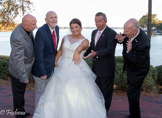 Taylor with her uncles @ Trump National Golf Club Mooresville, NC