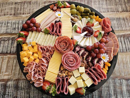 A charcuterie platter from Charcuterie Love Mckinney is the perfect way to entertain or gift someone special!