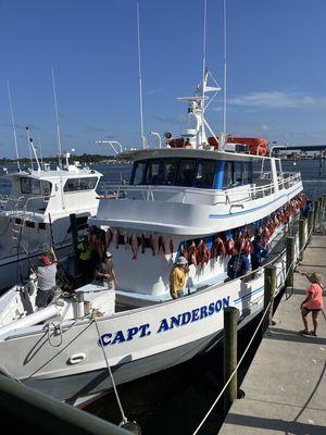 Captain Anderson's boat unloading the days catch