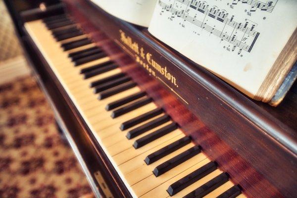 The parlor's original piano.