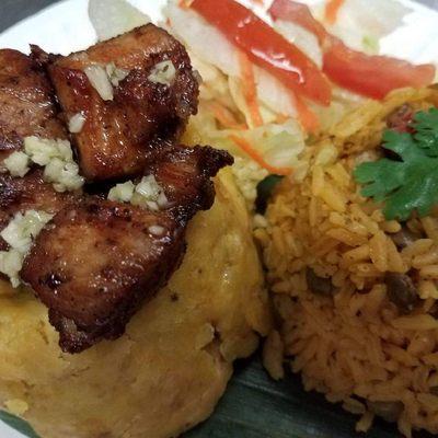 Mofongo de Masitas de Puerco/ Plantain Ball topped with Fried Pork Chunks