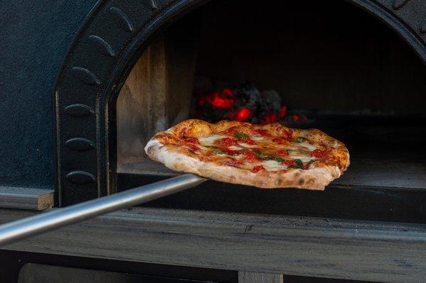 Kissed by the flames of a woodfired oven.