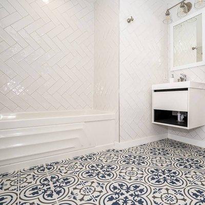 8"x8" Porcelain Floor Tile 
4"x16" Glossy Ceramic Tile installation in Horizontal Herringbone Pattern