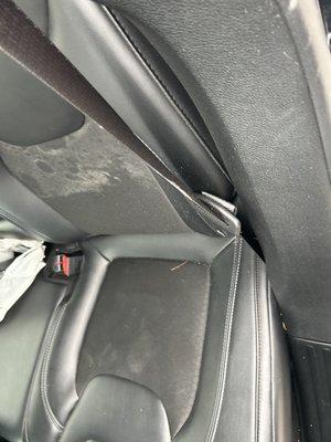 Another area of dirt inside vehicle.  Very dull seats , (could've used some kinda shine solution) Lied again