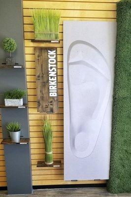 This artsy Birkenstock wall greets our customers as they enter the store