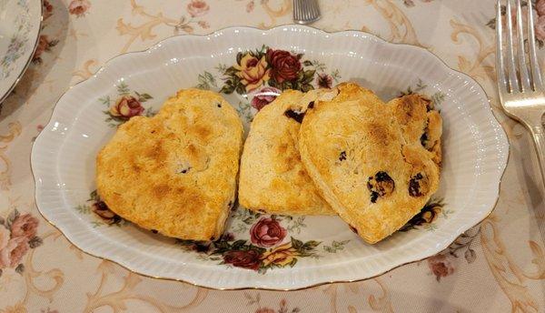 Heart shaped scones with cream