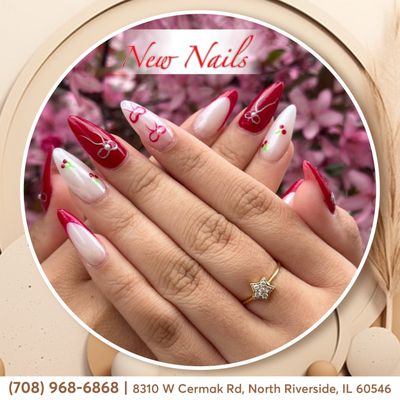 Springtime elegance, right at your fingertips!  Adorned with charming art bows, my red nails dance with the joy of the season.