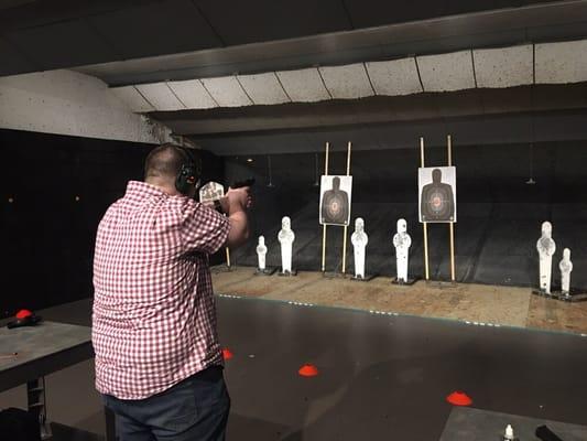 Concealed Carry student Tyler improves his handgun technique.