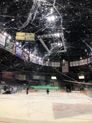 12/1/18. Scratches on the rinkside glass. The Mudbugs championship banners hang high from the rafters of Hirsch Coliseum. 2018 NAHL Champs!