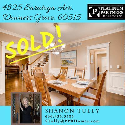 Happy clients completing a successful  sale of their staged home in Downers Grove!