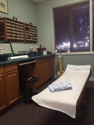 The main exam room with all the different herbs and samples he uses to test for allergies, etc.