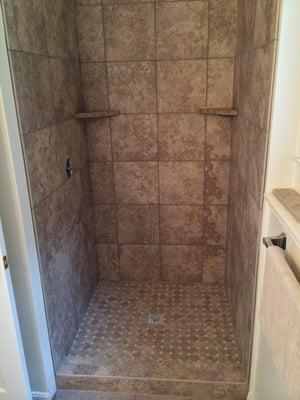 12x12 porcelain tile with granite corner selves