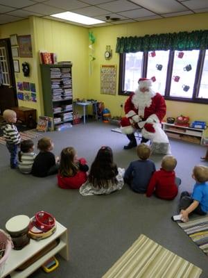 Santa Claus visits Jumping Frogs Preschool.