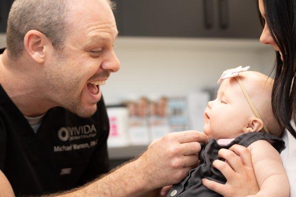 PA Michael Warren engaging with patients of all ages