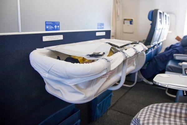 When traveling with an infant, we'll assist you with getting a "baby bed" on the international flight we booked.