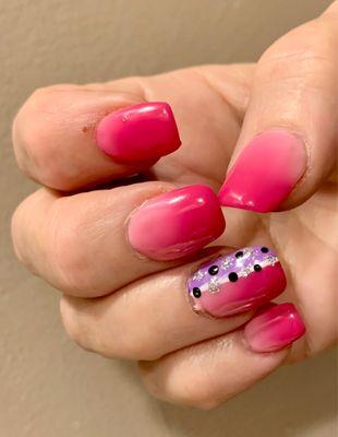 A beautiful vignette of fuchsia with a touch of glam on ring finger...design & gel nails created by owner/artist Tina.