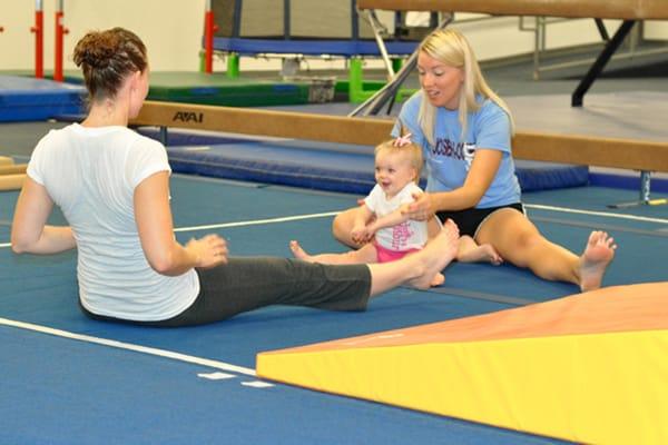 Miss Ashley leads stretch in an Early Development class.