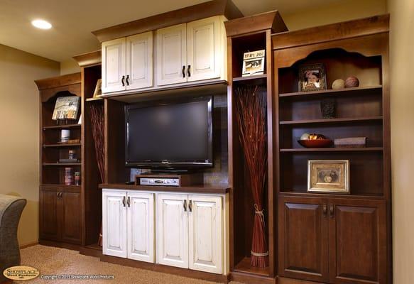 This entertainment center blends painted and stained finishes for a beautiful viewing space.