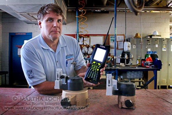 Editorial photo: Tucson Water employee in the shop