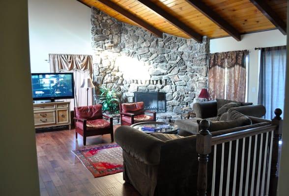 Main living room upstairs, bigger one down stairs