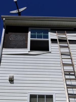 Replaced window and began replacing siding