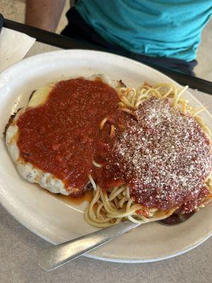 Chicken parmigiana with spaghetti.