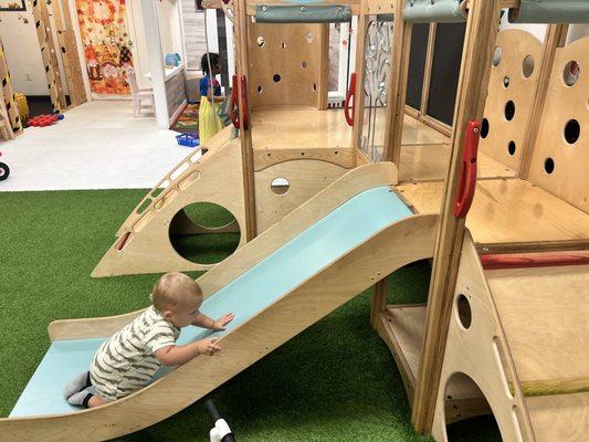 This little wooden play place is so cute.