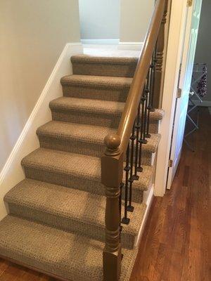 Our expert team carefully adjusted this carpet to perfectly fit these stairs.