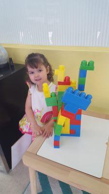 Our lobby includes an activity table for kids as they wait for their class to start.