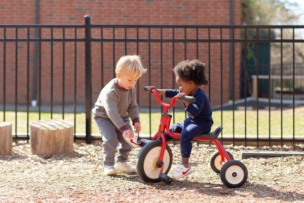 Our indoor and outdoor Toddler environments encourages freedom of movement, an atmosphere of respect, and the growth of independence.