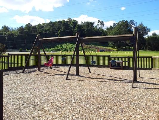 Toddler swings are here and there are 4 more "big kid"swings on the other side of the playground.