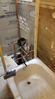 Bathroom gut renovation. Installation of new tub and showerbody