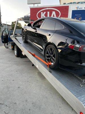 tesla had a dead battery in downtown los angeles, we towed it to a nearby charging station.