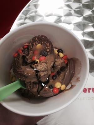 Skinny chocolate and vanilla with rocky road froyo and Reese's prices, peanut butter and chocolate syrup drizzled atop.