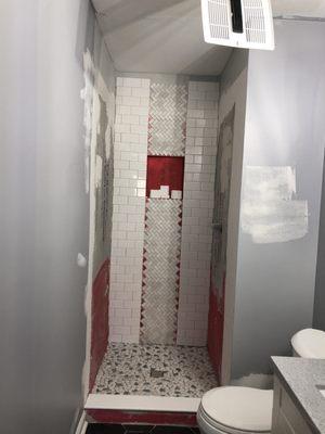 No red waterproofing on all3 shower walls