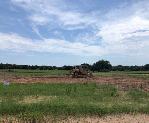 It's a beautiful day to move some dirt! Today we are out at New Hope Heights located south of Boyd working on some house pads.